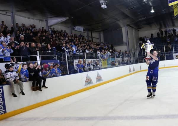 Fife Flyers - Russ Moyer shows the Gardiner Conference trophy to rthe fans (Pic: Steve Gunn)