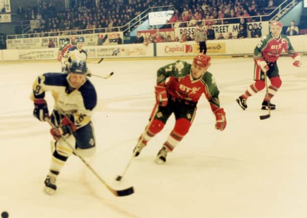 Fife Flyers -  Doug Smail against Cardiff Devils' Doug McEwen in front of a full house in Kirkcaldy, 1993-94