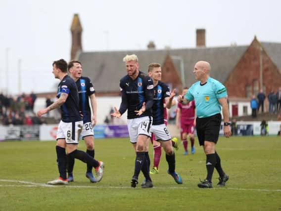 Raith defender Iain Davidson - making his 400th appearance for the club - seethes at referee Stephen Finnie after he awarded Arbroath an indirect free-kick in the box in the 79th minute. Pic: Graham Black