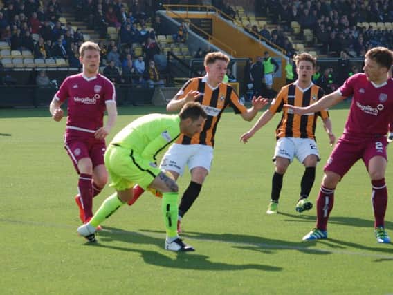 David Hutton is quickly off his line to snuff out this East Fife attack. Picture by Kenny Mackay.