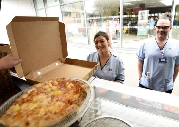 Tony Macaroni staff handed out an incredible 999 free pizzas to hard working nursing staff. Pic  credit- Walter Neilson.