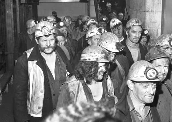 Miners from the day shift coming up from Seafield colliery at the time of the disaster in May 1973.