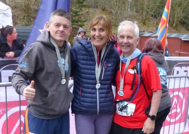 Robin Pate, Carole Mowbray and Jim Dunstan after completing the 53 mile Highland Fling race.
