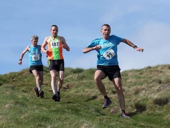 Brian Cruikshank [95] and Tony Martin [81] on the descent of Normans Law. Falkland Trail Runners