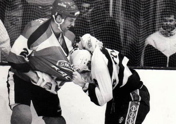 Old time derby: Mike Ware (Murrayfield Racers) fighting Rob Abel (Fife Flyers) 1993-94  (Pic: Bill Dickman)