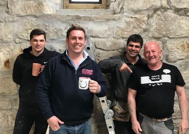 Steve Mitchell (front) with staff from  Kyriacou Joiners and D Hain Buidling Services who have been carrying out the renovation work.