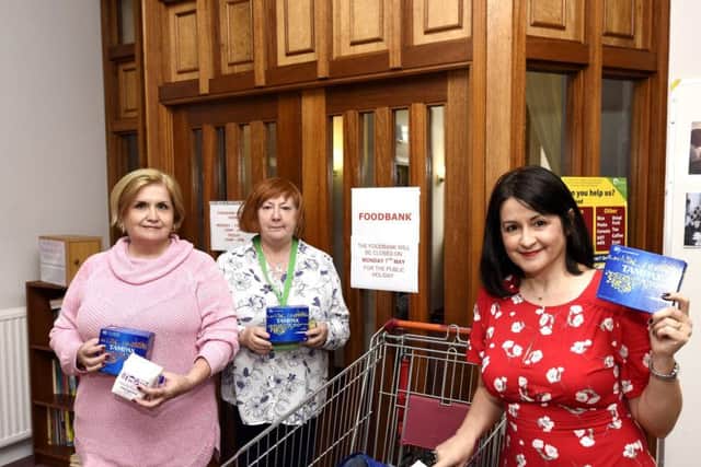 Joanna Tait , Maureen Closs and Marie Penman from the foodbank at St Bryce Kirk
