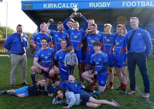 The victorious Kirkcaldy Sevens team with the Heggie Cup. Pic: Michael Booth