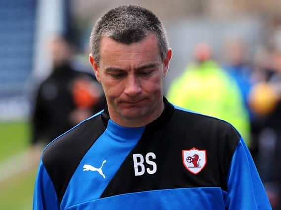 Dejected Raith boss Barry Smith heads for the tunnel after his team's play-off defeat to Alloa. Pic: Fife Photo Agency