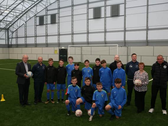 Left to right: Henry McLeish, chair of Fife Elite Football Academy, with players and coaches from East End Boys Club and Fife Elite under 13s, Tony Abbot, duty manager at Fife Sports and Leisure Trust, Cllr Judy Hamilton and Bill Hendry, operations manager for Fife Elite Football Academy.