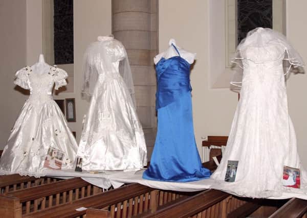 The exhibition of Wedding Dresses Through the Ages runs at Wellesley Parish Church until Saturday, May 19. (Photo: N.J. Myles)