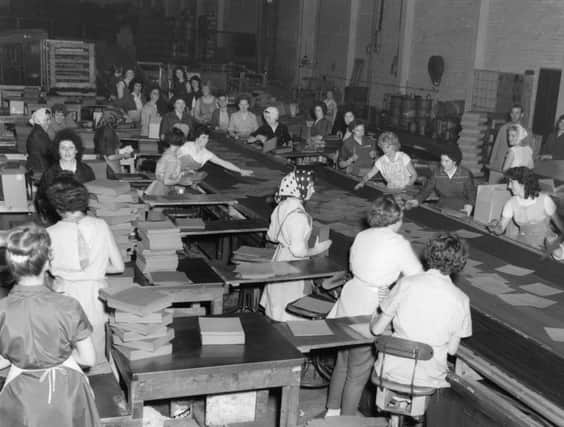 Hard at work in the heyday of lino production