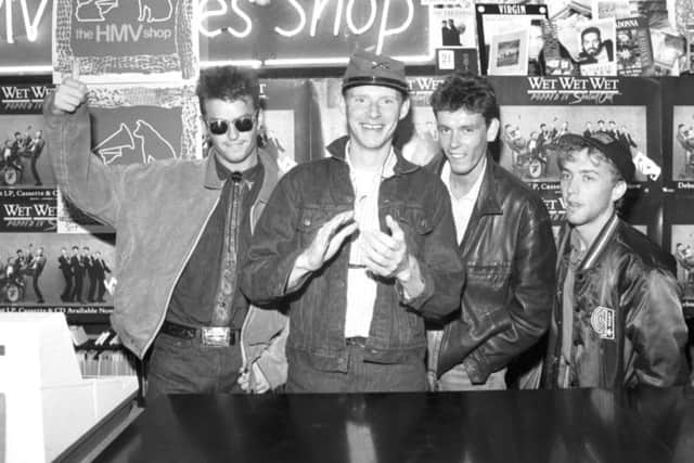 Scottish band Wet Wet Wet signing records at the HMV shop in Princes Street, Edinburgh in September 1987. L-r: Marti Pellow, Tommy Cunningham, Graeme Clark and Neil Mitchell. Pic: TSPL