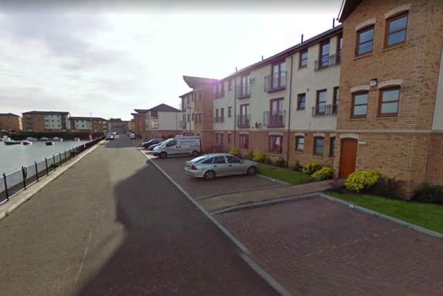 Police raided a property in Lord Gambier Wharf. Picture: Google