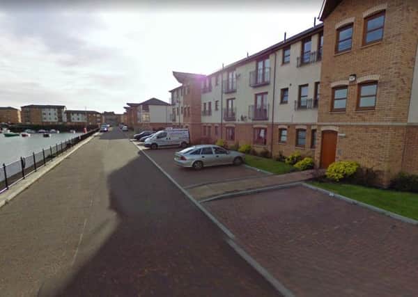 Police raided a property in Lord Gambier Wharf. Picture: Google