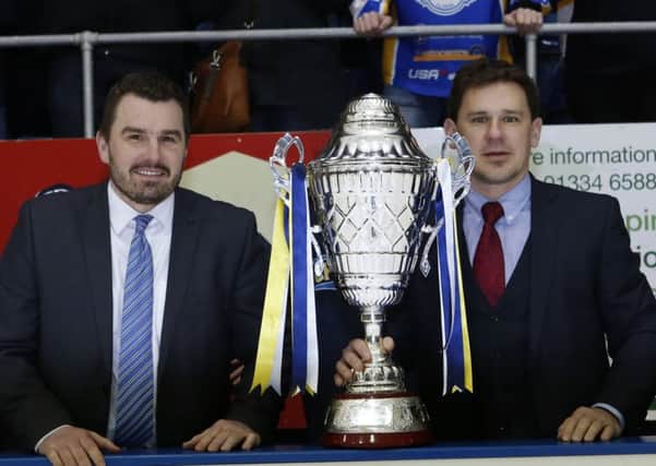 Fife Flyers assistant coach Jeff Hutchins (left) and head coach Todd Dutiaume with the Gardiner Conference trophy. Pic: Steve Gunn