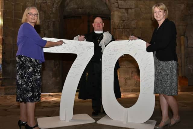 Tricia Marwick chair NHS Fife Health Board, Rt Rev Dr Derek Browning Moderator General Assembly Church of Scotland and Shona Robison MSP Cabinet Secretary for Health and Sport signing the 70th numbers

NHS Fife 70th anniversary interfaith service at Abbey Church, Dunfermline.