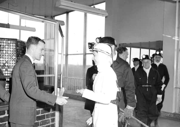Queen Elizabeth II visits Rothes Colliery near Kirkcaldy - Queen in white overalls