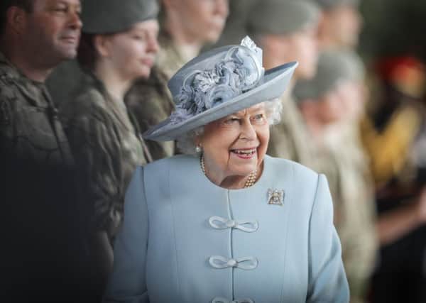 Smiles from the Queen as she visits Leuchars today (Thursday). Photo: Kris Miller/DCT Media