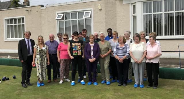 The Step-by-Step group enjoys a trip to the bowling, attended by David Torrance MSP.