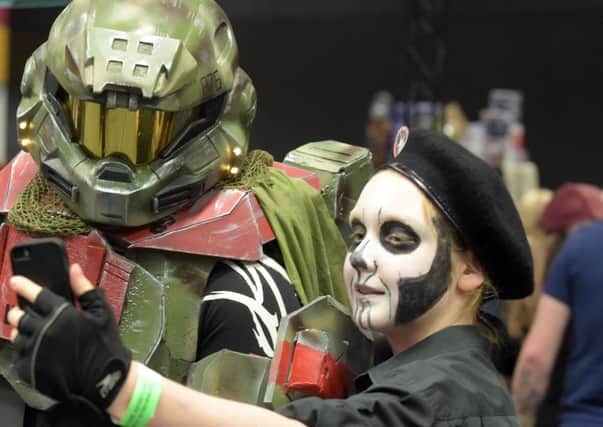 Comic cons bring many cosplay fans.