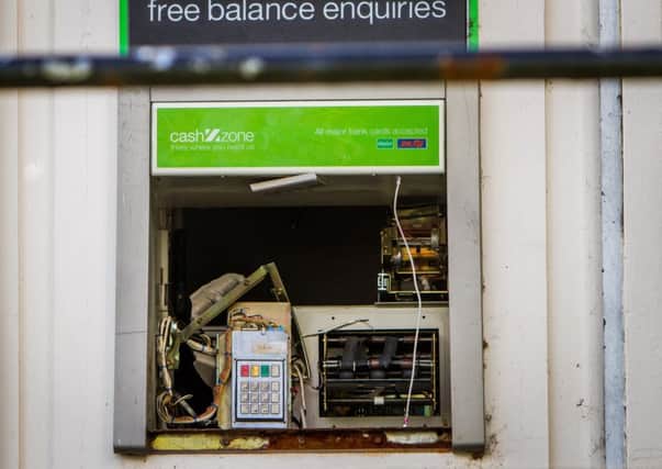 The bank machine was damaged in the raid.