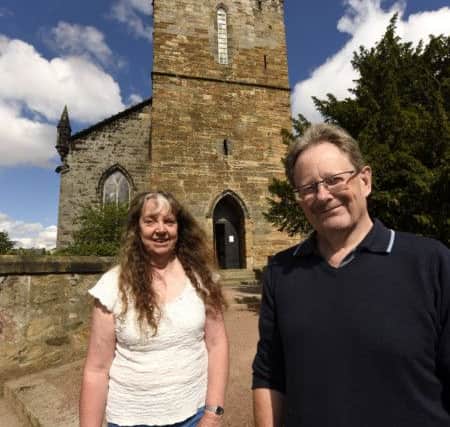 Rosemary and George in front of the Old Kirk
