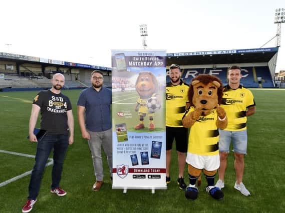 Marc Williamson and Joe Dixon from Tag Games with Iain Davidson, Kyle Benedictus and club mascot, Roary Rover. Credit - Fife Photo Agency.