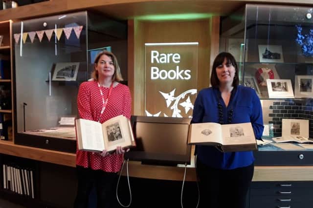 Sara Ann Kelly,  local studies officer, at ONFife Archives and author Cassie Kennedy in DCL&Gs Reading Room - Cassie donated to them a historically significant booik on Robert Burns she found in a charity shop barghain bin.