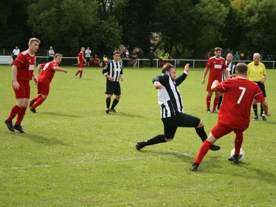 Action from Kirkcaldy YM's win over Newburgh. Pic: Graham Strachan