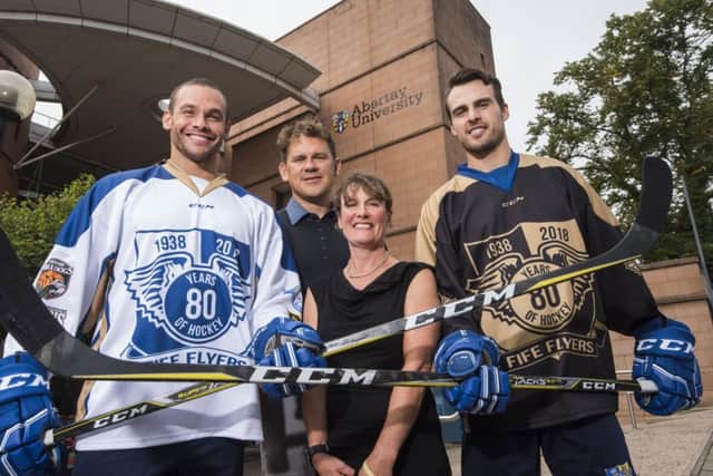 Fife Flyers launch new partnership with Abertary University - pictured are players Evan Stoflet (left) and Joe Basabara, who will be studying at the university, with head coach Todd Dutiaume, and Andrea Cameron from Abertay