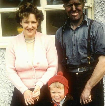 A typical day deliverying coal for Willie Matthew pictured here  with his wife Ena and son Andrew in the 1960s.