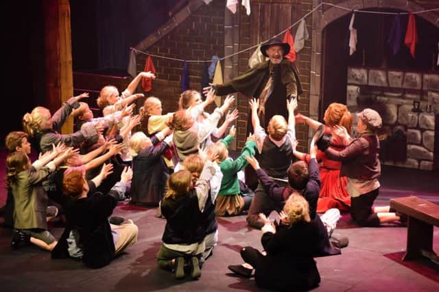 There were 18 children in the chorus for the show, and the role of Fagin was played by Alan Tricker