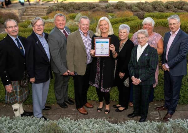 Members of Growing Kirkcaldy receiving the gold award from George Anderson of the Beechgrove Garden in Haddington recently.