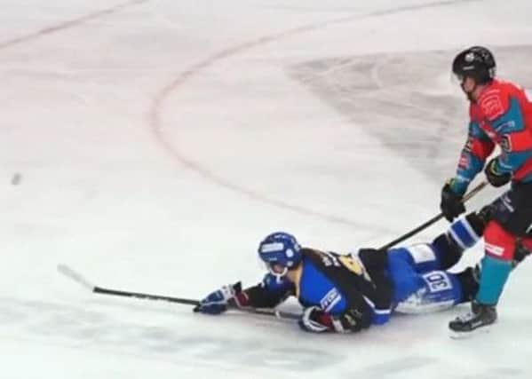 Fife Flyers forward Brett Bulmer scores while lying flat on his stomach in the 4-2 win over Belfast Giants. Pic: YouTube/Beflast Giants