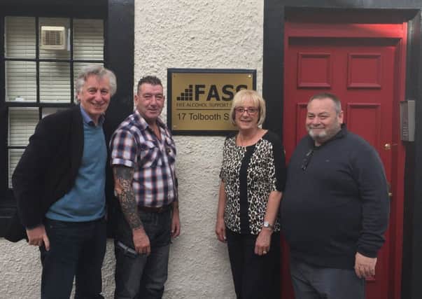 Here to help...the FASS team is based in Tolbooth Streeet, Kirkcaldy. From left to right: Jim Bett, service manager, Dave Dempster, substance misuse manager, Helen Hutton, alcohol counselling co-ordinator and Donald Grieve, Curnie Clubs manager.