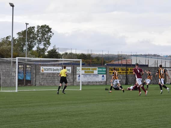Supersub Rory Currie prods home East Fife's winner. Picture by Kenny Mackay.