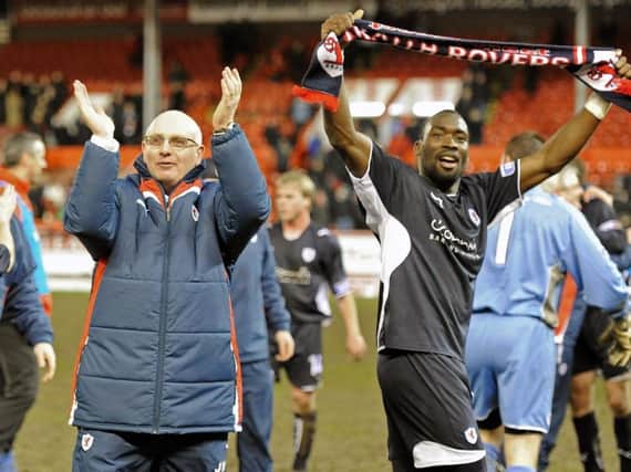John McGlynn celebrates the Scottish Cup fifth round win at Aberdeen in February 2010, with goalscorer Gregory Tade. Pic: Neil Doig