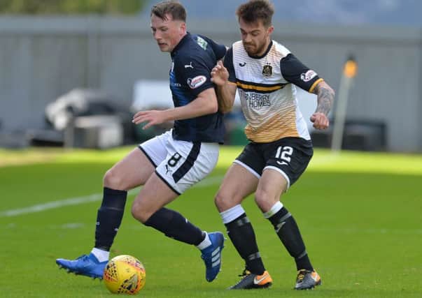 Regan Hendry (Raith) and Brad Spencer (Dumbarton) during the SPFL League 1 match between Dumbarton and Raith Rovers at the C & G Systems Stadium. where the visitors took all three points back to Fife with an emphatic 5-1 win for new manager John McGlynn.  (c) Dave Johnston / Alba Pictures