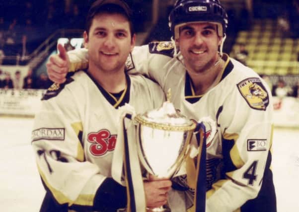 Fife Flyers - British champions, 2000. David Smith (left) and captain, Frank Morris, on-ice with the silverware