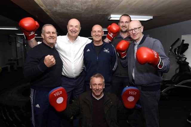 Back (from left) George Forrester, Cllr Neil Crooks, Greig Hopcroft,  Mike Keane, Cllr Alistair Cameron, and front, Cllr Ian Cameron, at the redeveloped Kingdom Boxing Club premises. Pic: Fife Photo Agency