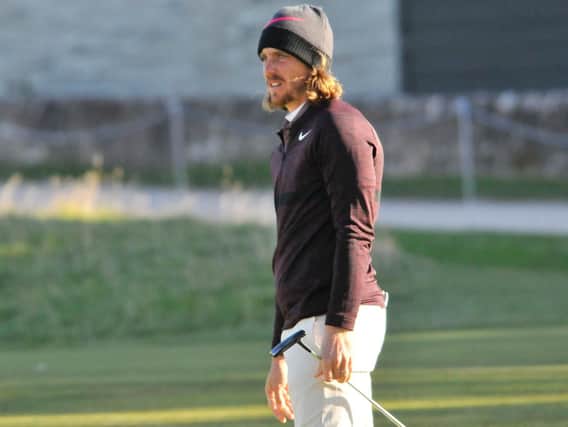 Tommy Fleetwood is trying to wrestle Tyrrell Hatton's Dunhill crown from him. Pic by John Stewart.