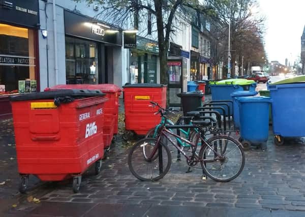Councillors complained that cycle racks in St Andrews are being rendered inaccessible by businesses putting out their bins.