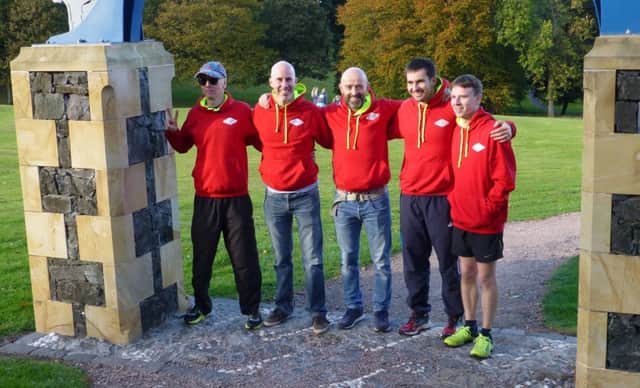 Chris Russell, Alan Davie, Mark McLean, Andy Cargill and Bryan McLaren who took part in the Scottish Long Coastal Relay race around the Fife Coastal Path from Culross to Newburgh.