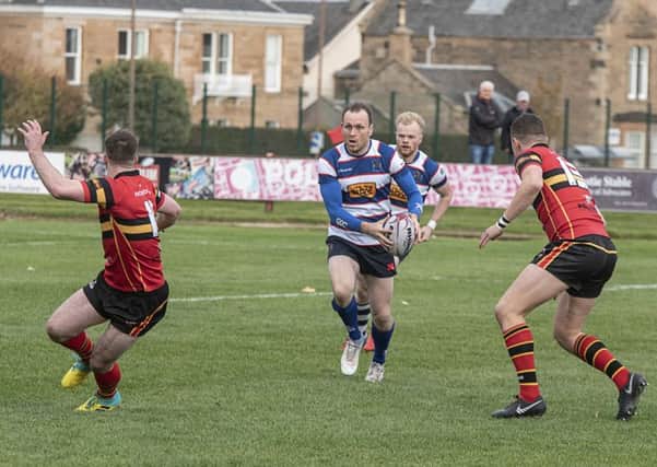 The experienced Graham Thomson looking for a way through the defence. Pic by Chris Reekie.