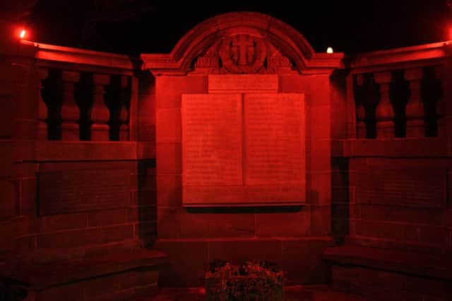 Elie War Memorial lit up red   to mark Scottish poppy appeal and the 100th anniversary of the end of WW1