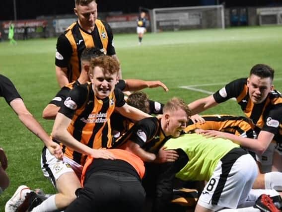 There's no hiding the joy amongst the East Fife players after Aaron Dunsmore's late winner. Picture by Kenny Mackay.