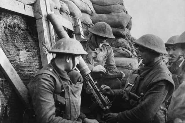 British WW1 machine gun troops in a trench