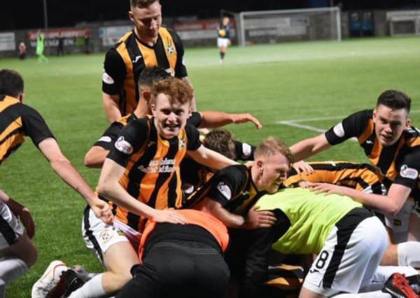 Delighted East Fife players after Aaron Dunsmore's winner on Saturday. Pic by Kenny Mackay.