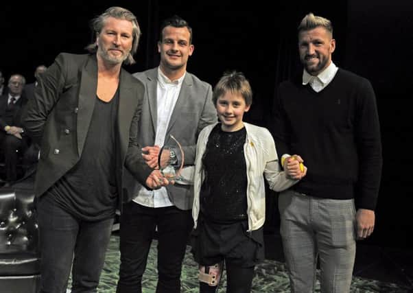 Katie Pake receives her special award from Robbie Savage (Pic: Michael Gillen)